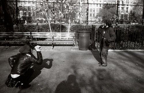 dave-schubert-Dash-Snow-taking-a-Polaroid-photo.-NYC-2004